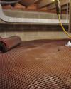 Crawl space drainage matting installed in a home in Euless