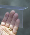 Closeup of a clear plastic covering on a Lewisville crawl space block wall