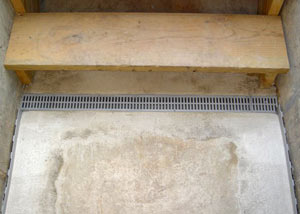 Our grated drain system installed on a leaking basement staircase in Hurst.