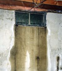 Flooding through basement windows in a Duncanville home.