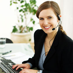 A disaster restoration customer service expert in Garland manning the phones