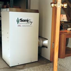 A basement dehumidifier with an ENERGY STAR® rating ducting dry air into a finished area of the basement  in Duncanville