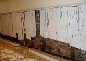 A wet, flooded finished basement in Allen