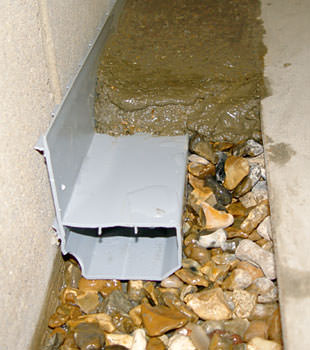A basement drain system installed in a Mesquite home