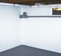 basement vapor barriers on the walls in a formerly leaky basement in Dallas, TX