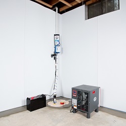 a complete basement waterproofing system installed in a Fort Worth home
