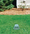 A buried gutter drain downspout extension installed in a Duncanville home
